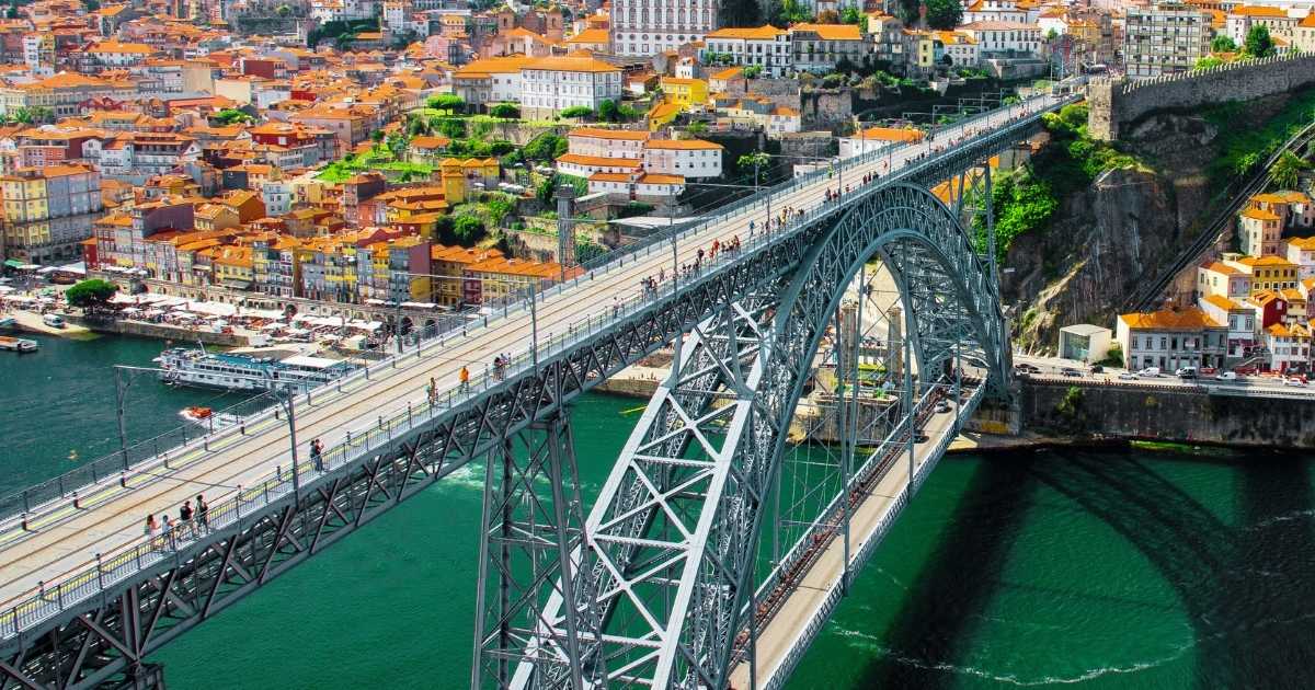Historic stone and steel structures in Porto, Portugal, illustrating the built environment and the Technosphere